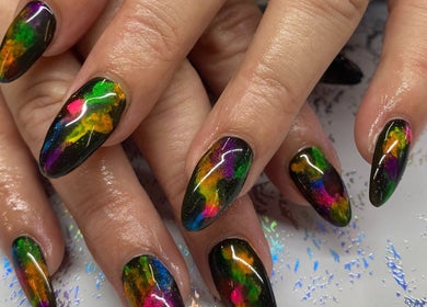 Vibrant neon nails at Skyhawk Beauty, Christchurch, Canterbury, NZ offer a bold, artistic look.