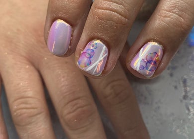 Close-up of holographic nail art at Skyhawk Beauty, Christchurch, Canterbury, NZ, featuring pastel and bubble designs.