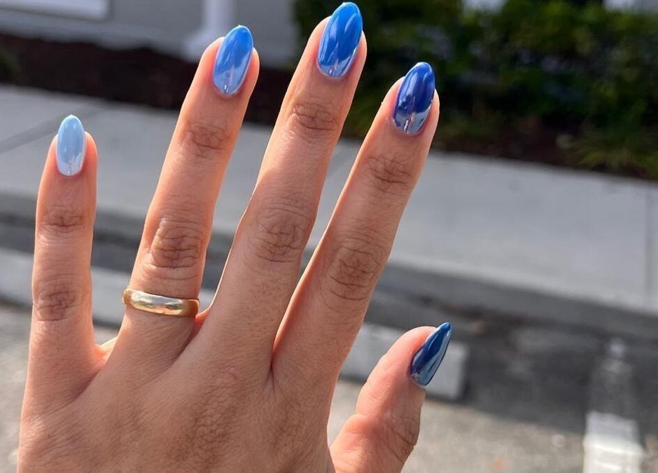 Elegant blue ombre manicure at Carolinailedit, Wellington, Florida, US.