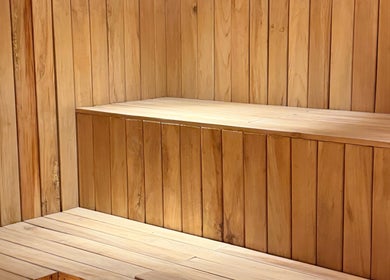 Relaxing wooden sauna at KU Salon and Spa, Nusa Tenggara Barat, ID, offering ultimate wellness escape.
