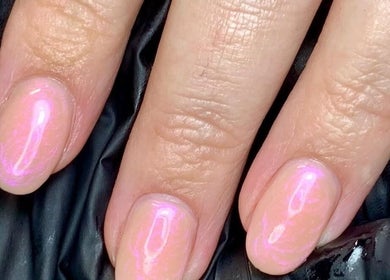 Glimmering pastel nails at The Elizabeth Nail Co., Shoreham-by-sea, England, GB enhance beauty and style.