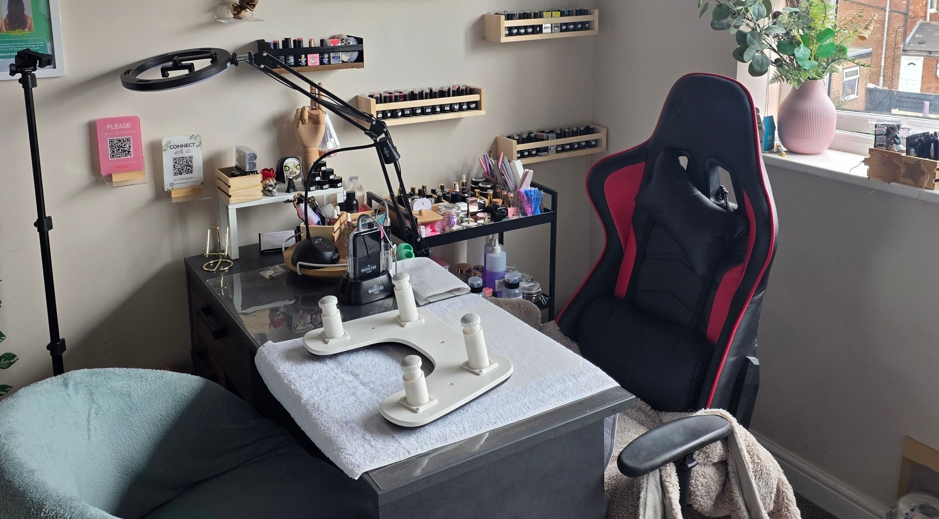 Relaxing nail salon setup at Sanctuary by Nymeria | Nymeria UK in Barnsley, England, GB with cozy chair.