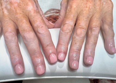 Fresh pink nails manicure at Pixie Glow Aesthetics, Harlow, England, GB, highlighting professional nail care.