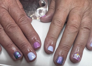 Pastel nail art with floral accent at Pixie Glow Aesthetics, Harlow, England, GB.
