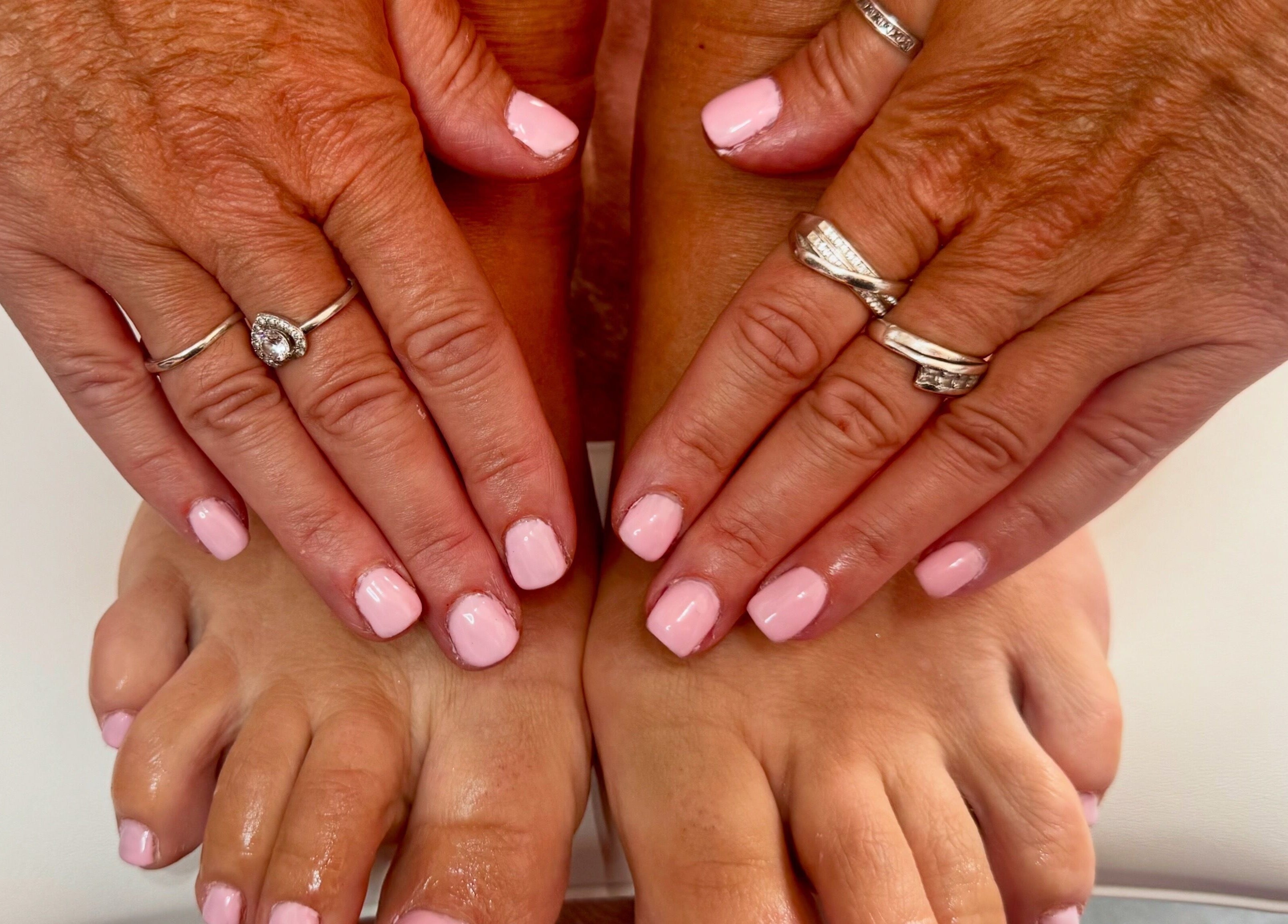 Freshly manicured hands and pedicured feet at Pixie Glow Aesthetics & Nails, Harlow, England, GB.