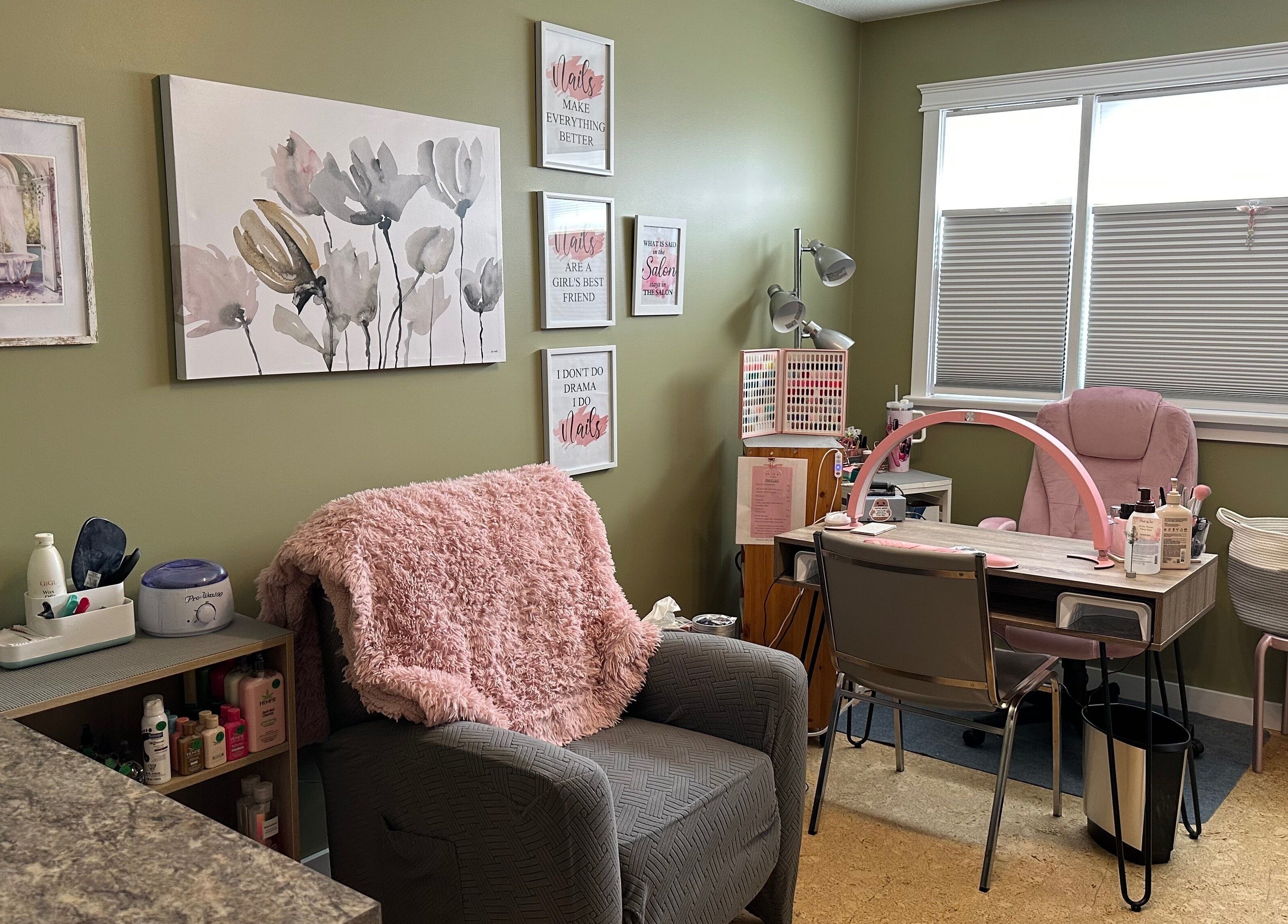 Inviting nail salon setup at Nails by Val, Saint Paul, Alberta, CA with chic decor and plush seating.