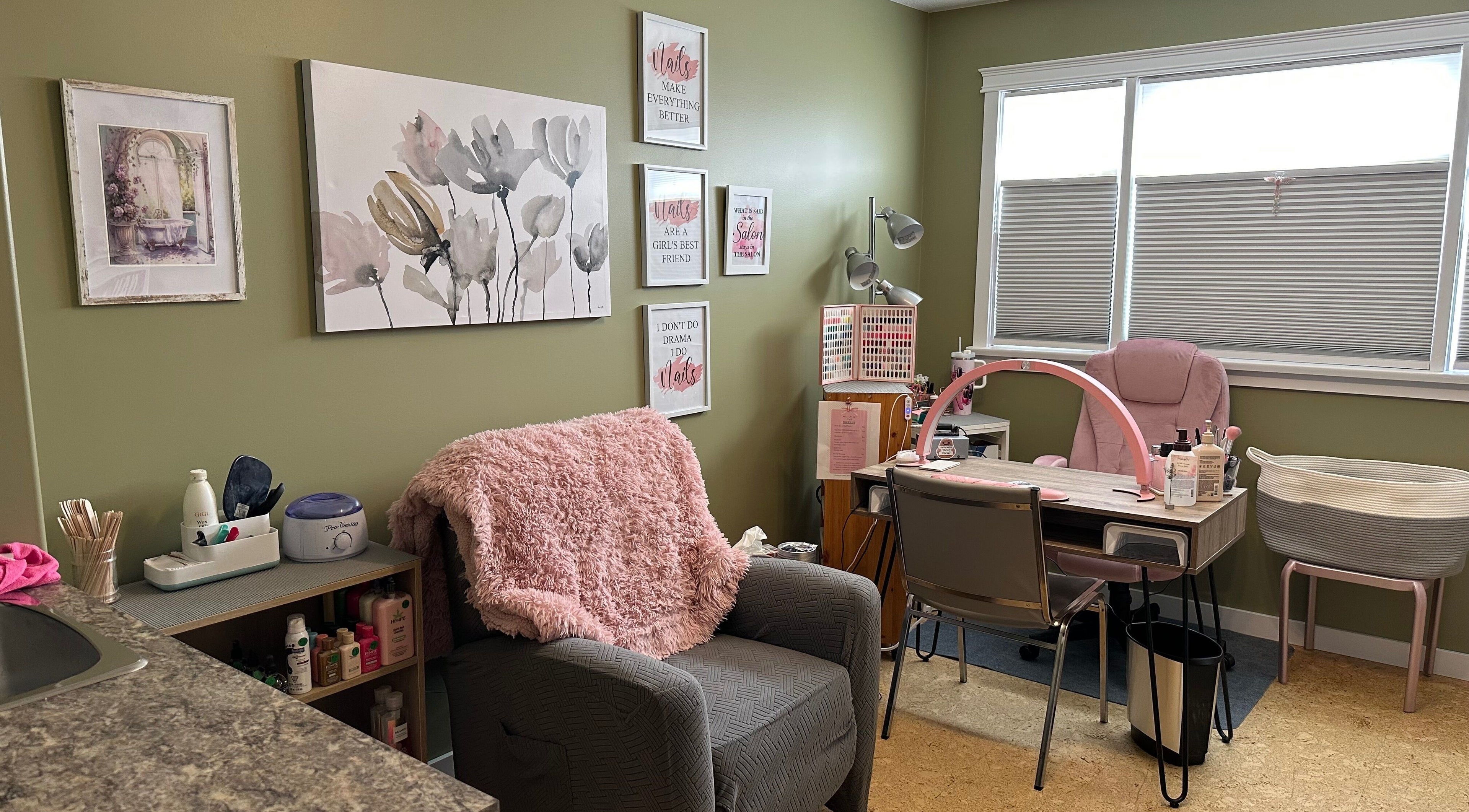 Inviting nail salon setup at Nails by Val, Saint Paul, Alberta, CA with chic decor and plush seating.