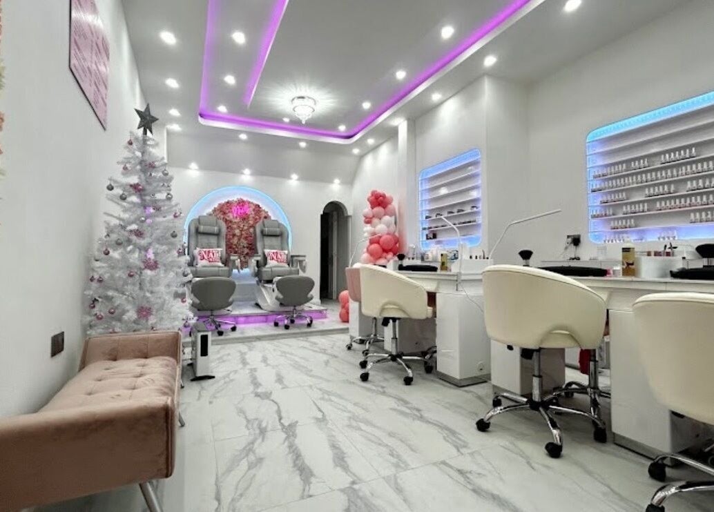 Stylish interior of The Nail Stop, Oldbury, England, GB, featuring modern decor and vibrant seating.