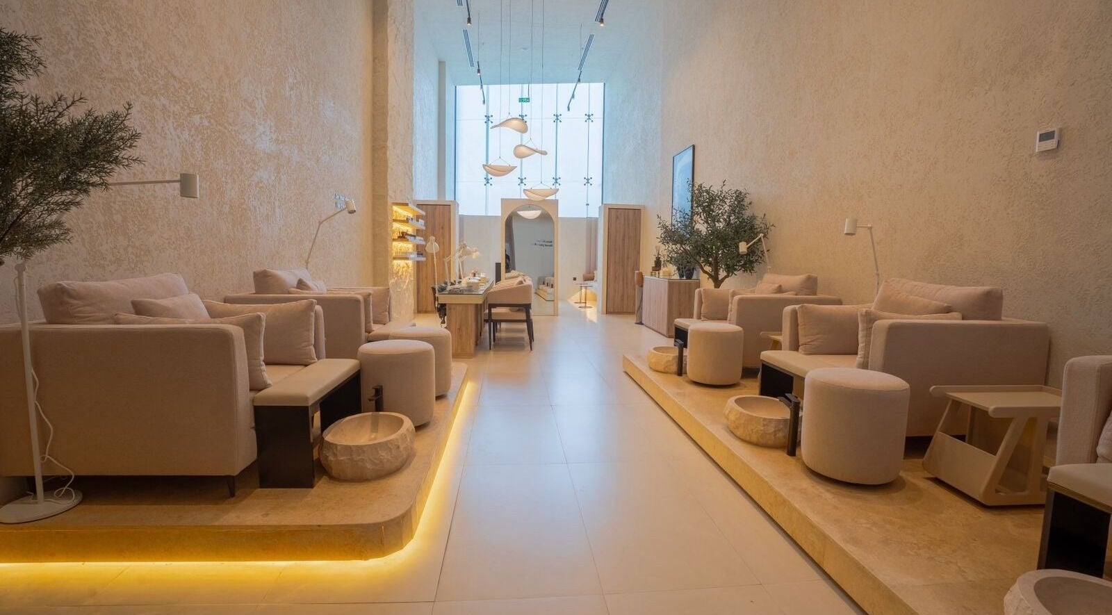 Elegant interior of Krasota Nail Salon in Riyadh, Riyadh Province, SA featuring plush chairs and ambient lighting.
