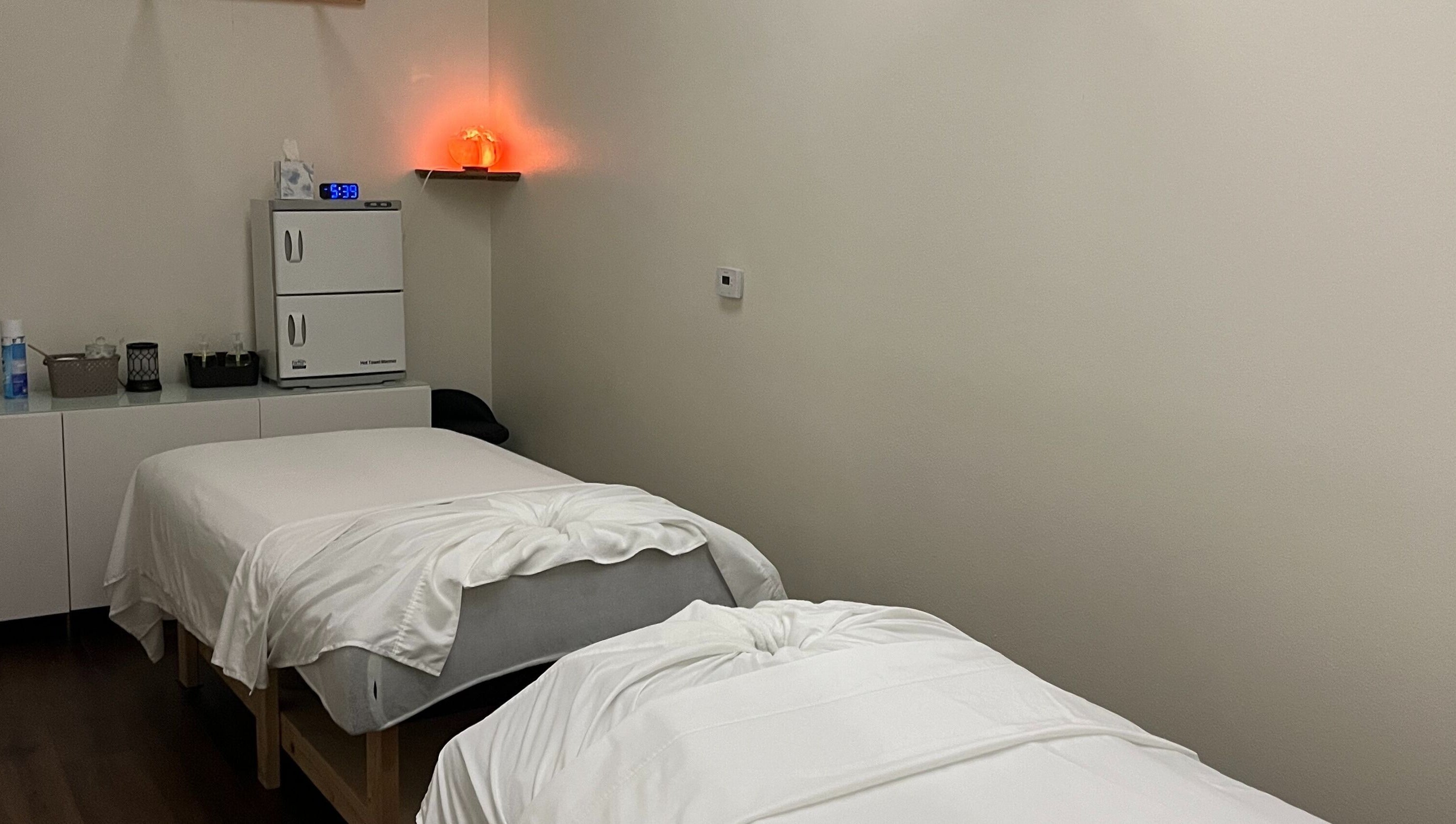 Tranquil massage room with cozy beds at June Spa Retreat Thai Massage, Facials and Waxing, Las Vegas, Nevada, US.