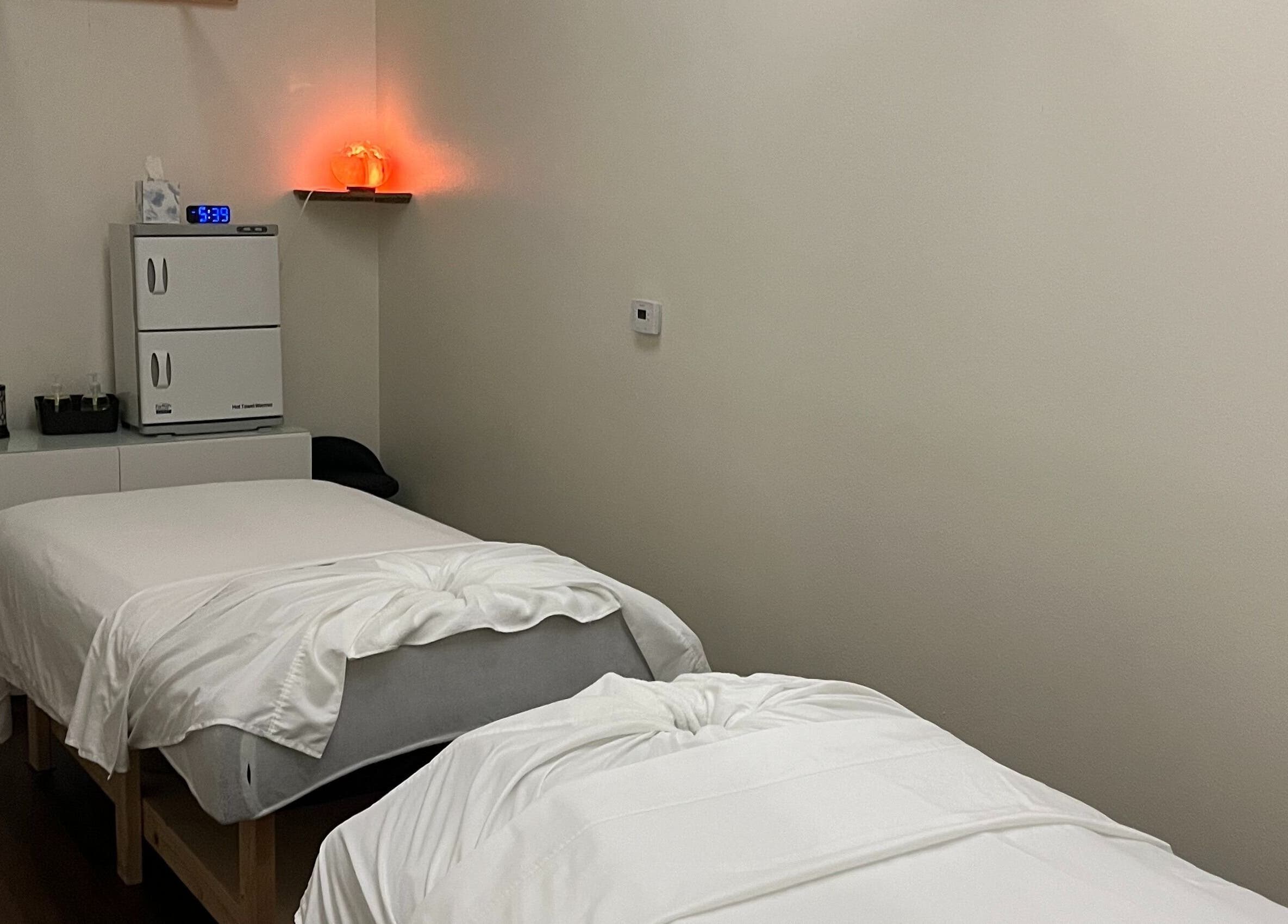 Tranquil massage room with cozy beds at June Spa Retreat Thai Massage, Facials and Waxing, Las Vegas, Nevada, US.