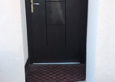 Sleek black door entrance at Sea View Beauty, Poole, England, GB.