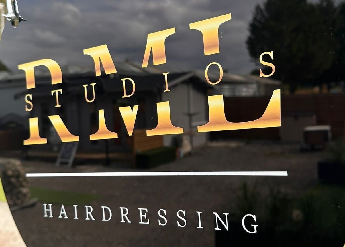 RML Studios hairdressing sign reflects the stylish exterior in Brentwood, England, GB.
