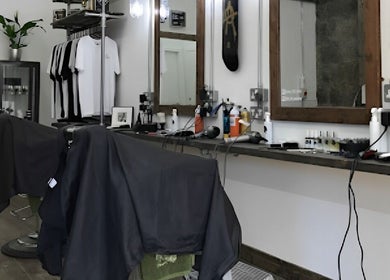 Elegant interior of Gia beauty salon in Aberdeen, Scotland, GB showcasing styling stations and modern decor.