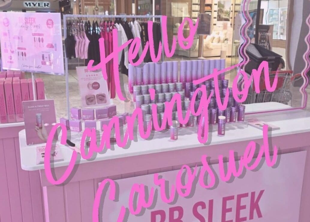 Bad & Boujee Hair - Westfield Carousel in Cannington, WA, showcases vibrant pink beauty products display.