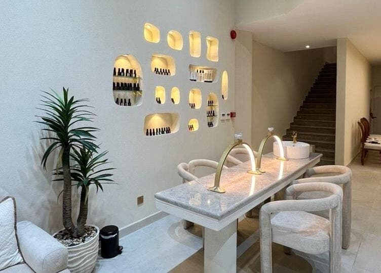 Stylish interior of صالون مكحال in Riyadh, Riyadh Province, SA with modern nail care setup.
