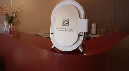 Skin analysis machine at Penelope Gomes Beauty, Il-gżira, MT with sleek red counter.