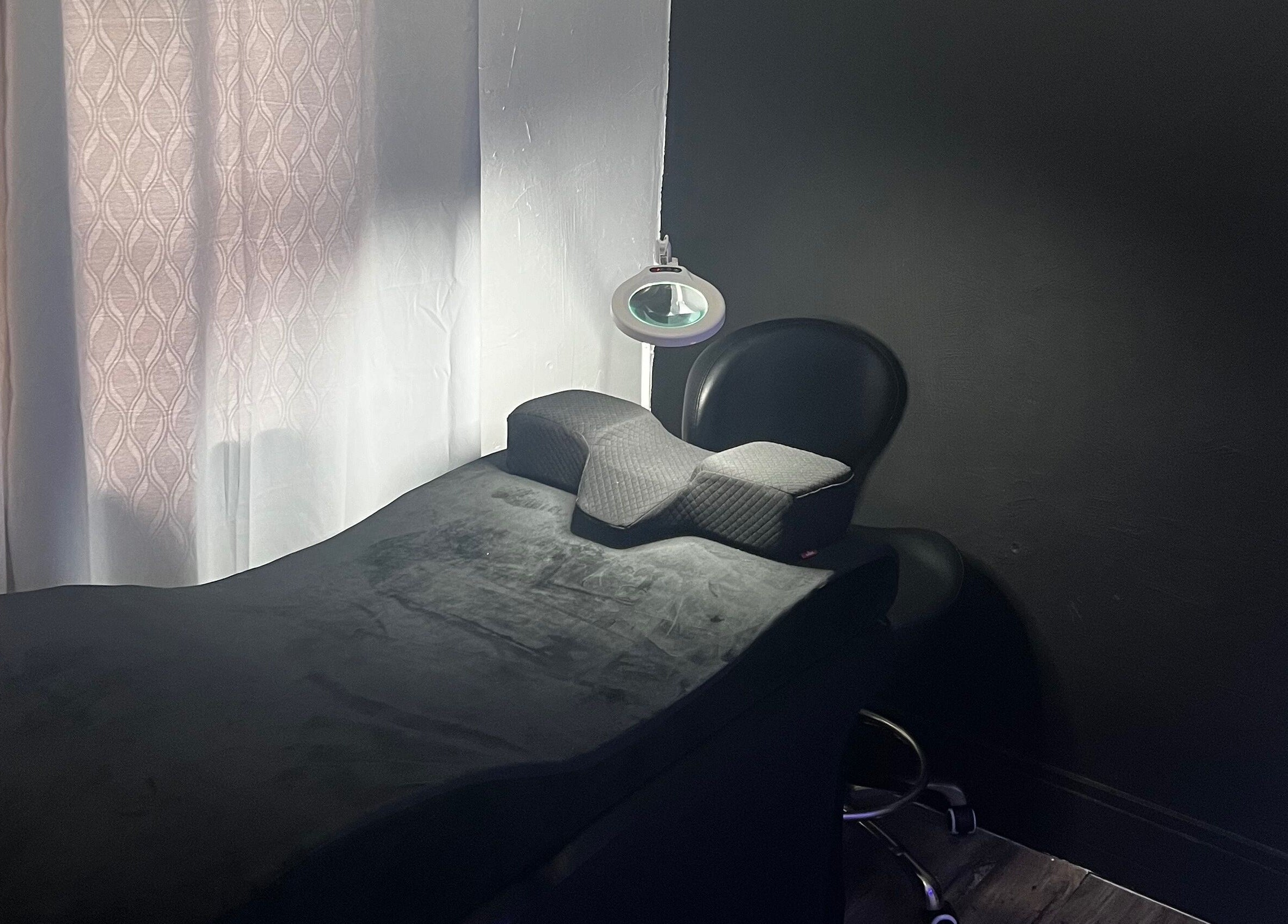 Eyelash treatment chair at The Lash Alchemist in Montego Bay, St. James Parish, JM, offering a relaxing experience.