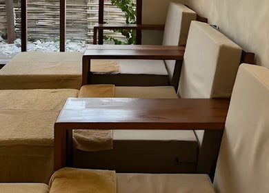Calm seating area in Sol Spa Gili, Nusa Tenggara Barat, ID, with plush cushions and soft lighting.