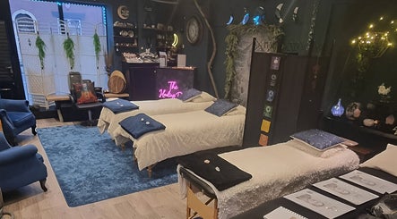 Cozy wellness interior at The Healing Room Oldham, Lees, England, GB, featuring treatment beds and calming decor.