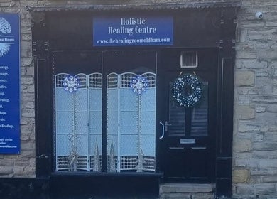 Front view of The Healing Room Oldham in Lees, England, showcasing its inviting entrance and signage.