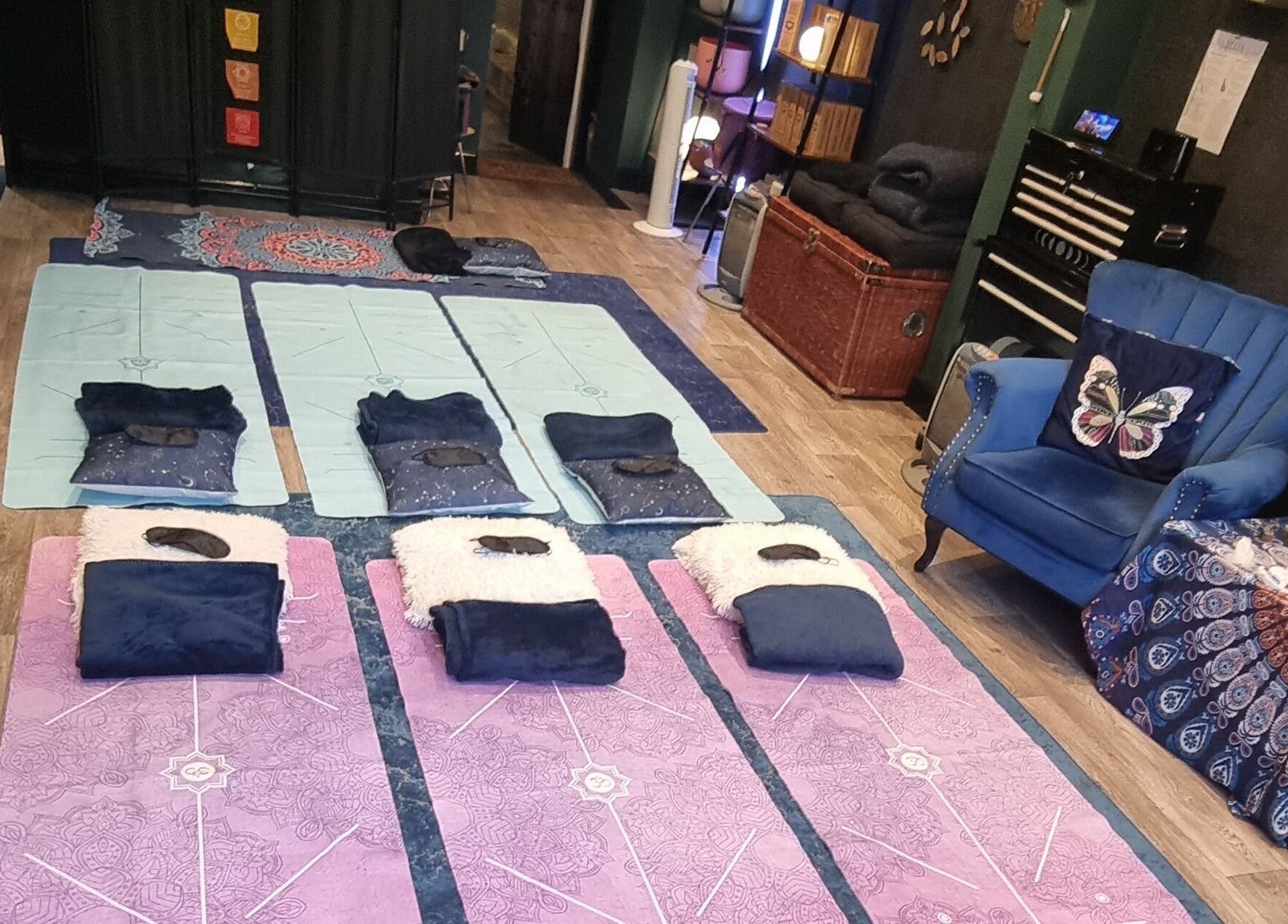 Yoga mats and cushions at The Healing Room Oldham, Lees, England, GB, create a relaxing atmosphere.