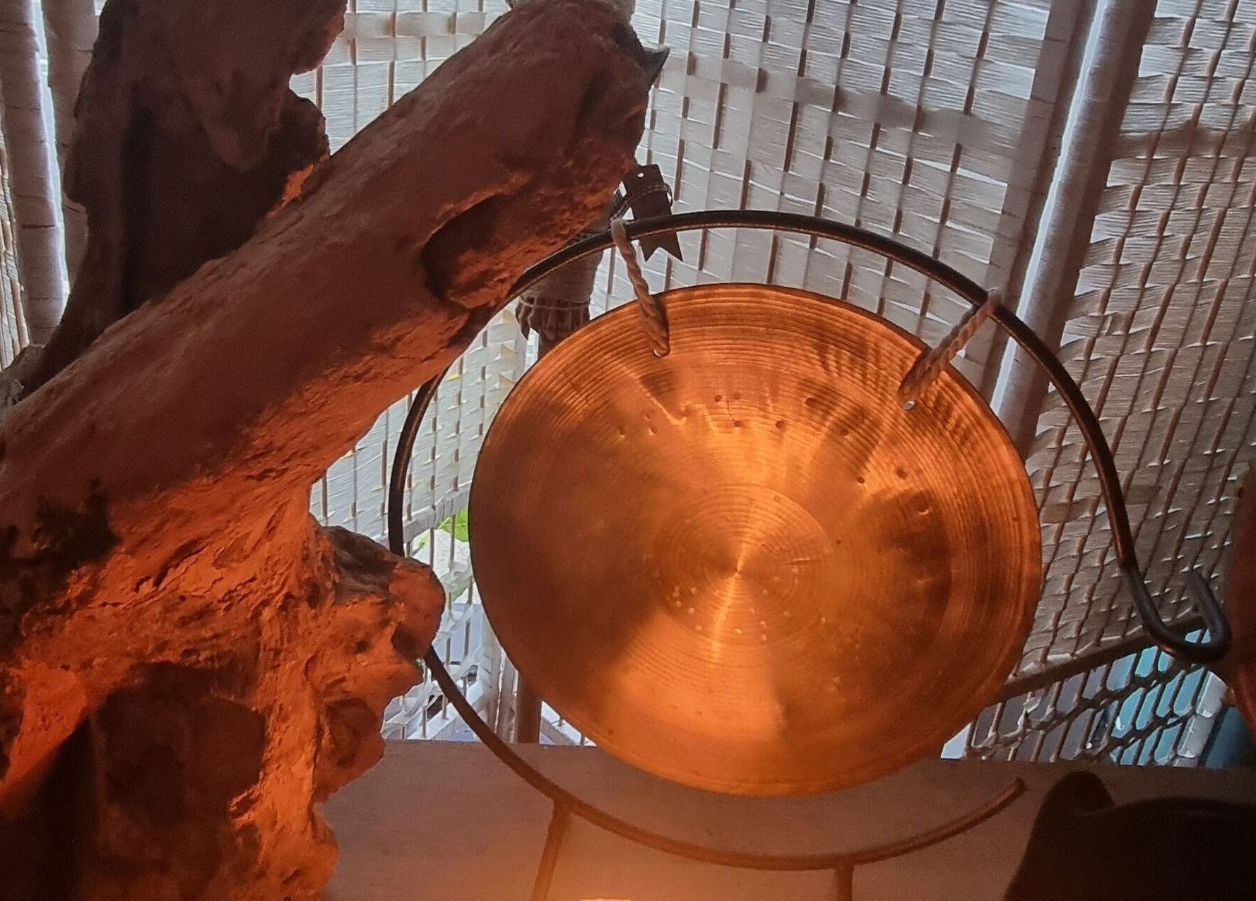 A calming gong at The Healing Room Oldham in Lees, England, GB, enhancing a tranquil ambiance.