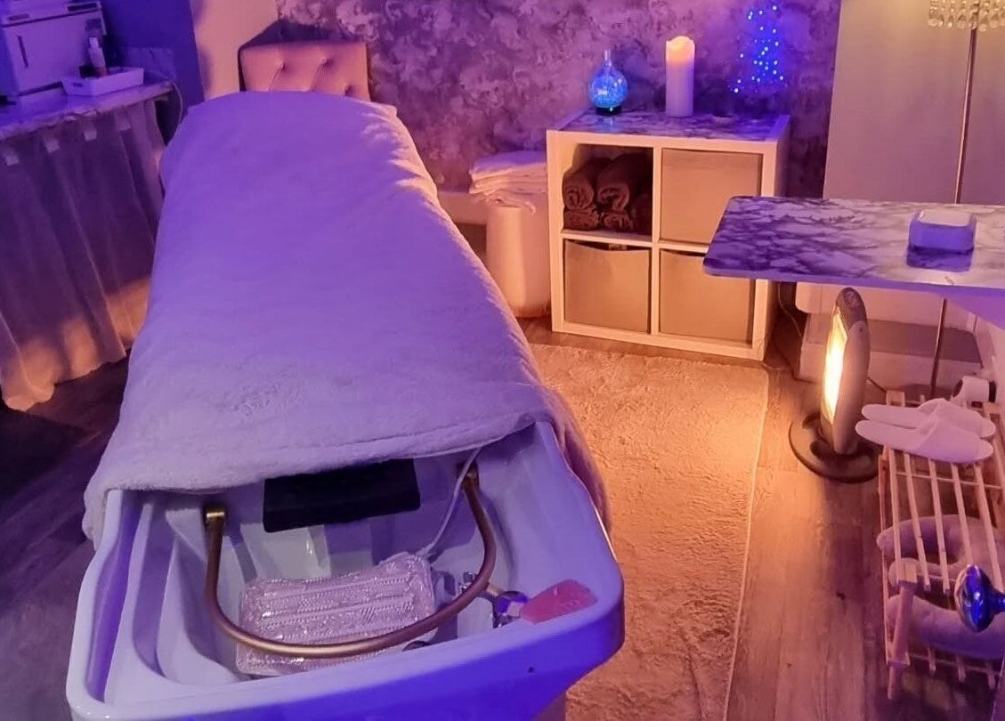 Relaxing spa treatment room at The Healing Room Oldham, located in Oldham, England, GB, with calming ambiance.
