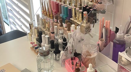 GlossedByCici nail polish display at Balgowlah Heights, New South Wales, AU, featuring a variety of colorful bottles.