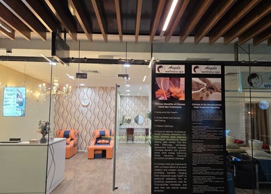 Front view of Angels Wellness Spa in Perth, Western Australia, AU showcasing elegant interior with seating area.