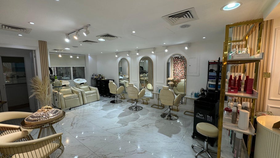 Interior view of Glamsoul Beauty Lounge in Abu Dhabi, showcasing chic salon seating and modern decor.