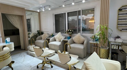 Luxurious pedicure area at Glamsoul Beauty Lounge in Abu Dhabi, AE, with plush chairs and decorative elements.