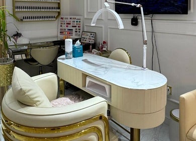 Chic nail station at Glamsoul Beauty Lounge, Abu Dhabi, AE showcasing luxury decor and comfort.
