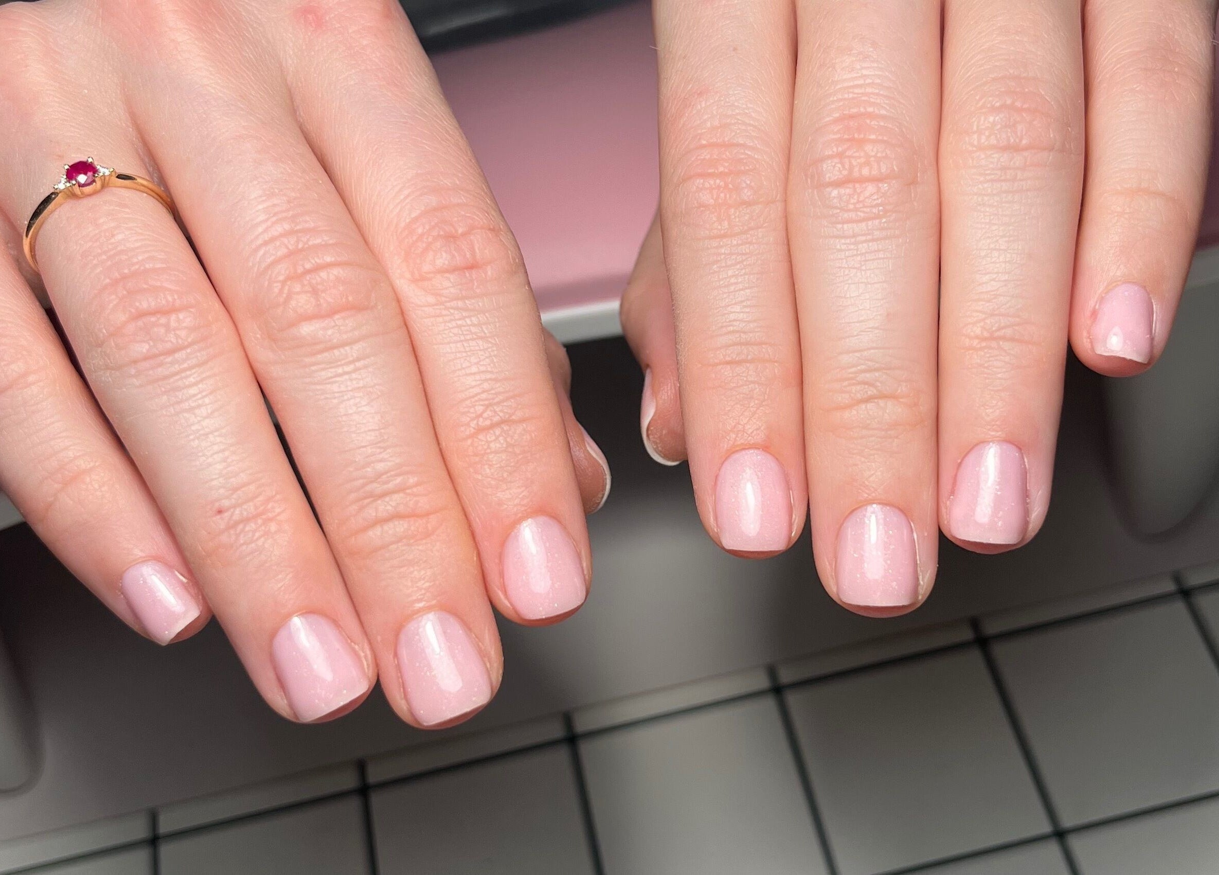 Elegant pink manicure at Naked Skin Space, Glenmore Park, New South Wales, AU.