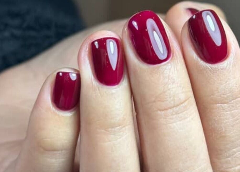 Beautiful crimson manicure at Naked Skin Space, Glenmore Park, New South Wales, AU.