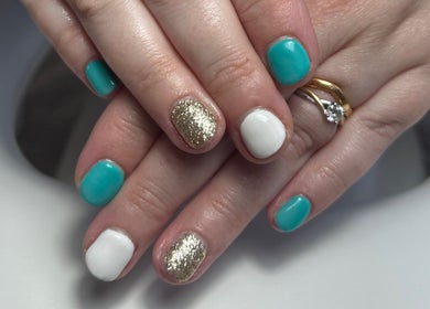 Styled nails in turquoise, white, and gold glitter at Polished By Em, Polesworth, England, GB.