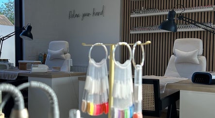 Elegant nail salon interior at Polished By Em in Polesworth, England, GB, featuring modern decor and manicure stations.