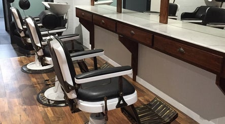 Elegant barber chairs at Style Lounge Hairdressing and Barbering, Melbourne, Victoria, AU.