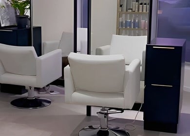 Elegant salon chairs in Alchemy Hair & Beauty, Cape Town, Western Cape, ZA, offering a stylish pampering experience.