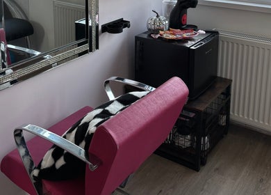 Elegant salon chair and mirror at Zoe Lottie - Hair, Shinfield, England, GB, showcasing a stylish beauty setup.