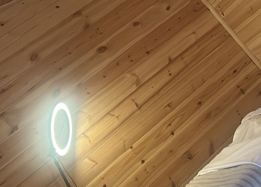 Warm wooden ceiling and soft light at By Madison Olivia, Kirk Sandall, England, GB.