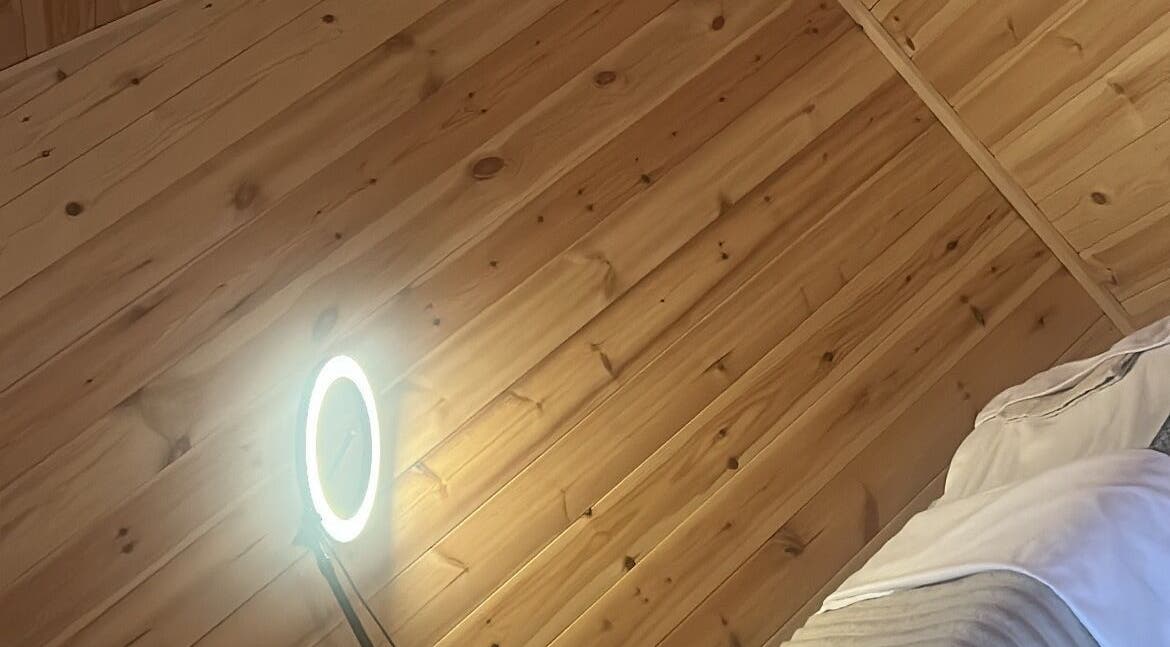 Warm wooden ceiling and soft light at By Madison Olivia, Kirk Sandall, England, GB.