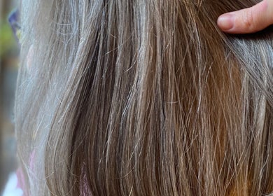 Close-up of smooth, sleek hair at Samantha Quick Hair in Niagara Falls, Ontario, CA.