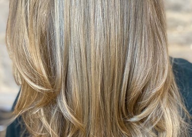 Stunning layered blonde hair at Samantha Quick Hair, Niagara Falls, Ontario, CA.