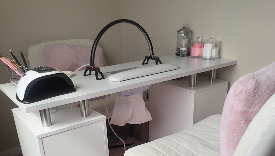Chic nail station at AJ Beauty, Bath, England, GB featuring tools and cozy seating.