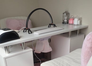 Chic nail station at AJ Beauty, Bath, England, GB featuring tools and cozy seating.