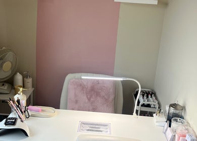 Elegant nail station at AJ Beauty, Bath, England, GB, featuring stylish decor and high-quality tools.