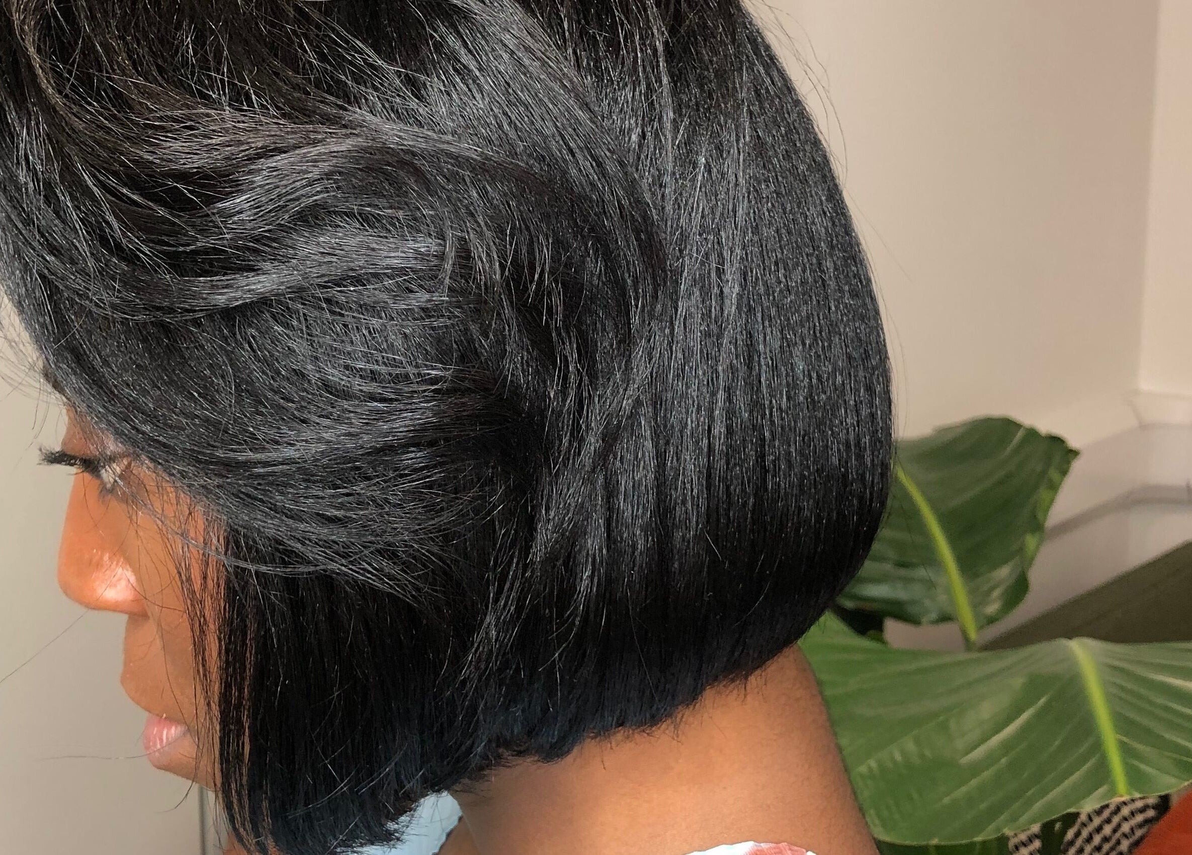 Elegant black bob hairstyle at PhedeliaRose, London, England, GB. Perfectly styled short hair.