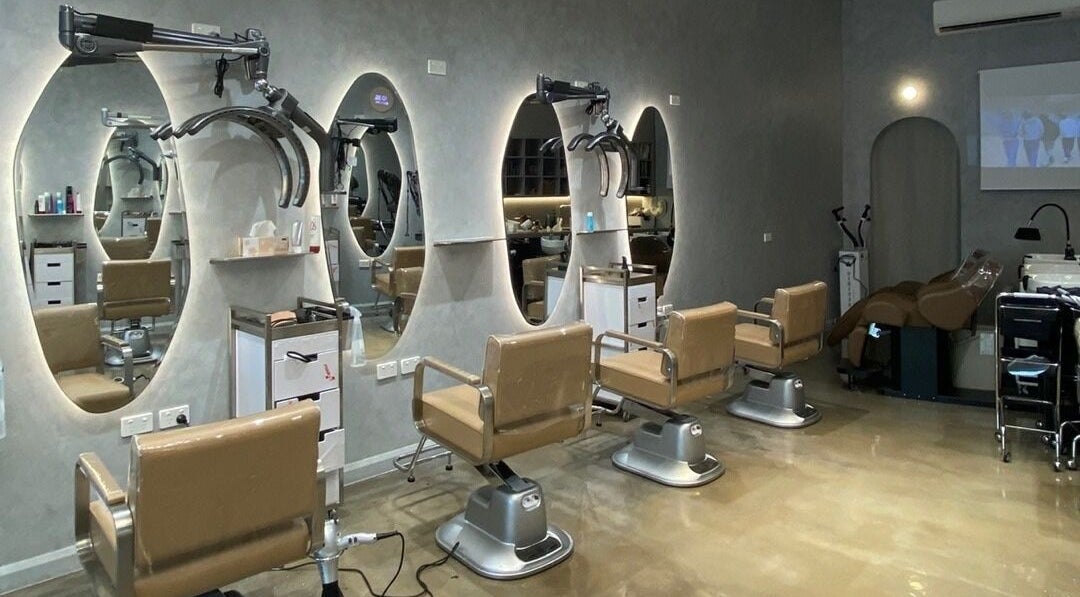 Luxurious salon interior at Ora No1, Lidcombe, New South Wales, AU featuring modern styling chairs.