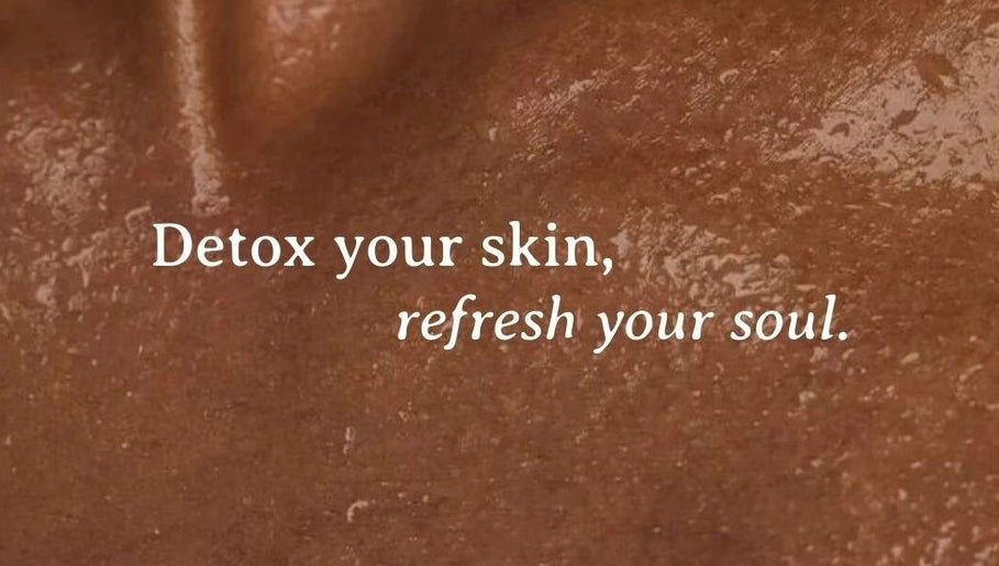 Mudita Rituals spa in Bali showcases detox treatment message on textured background.